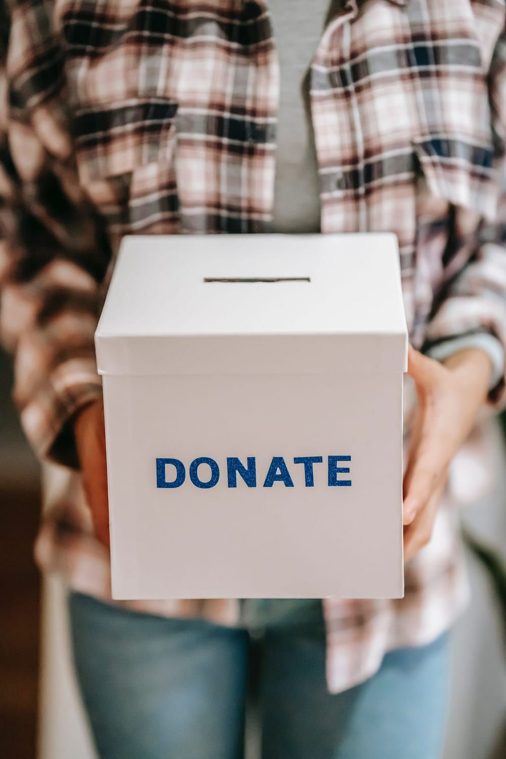 Holding donation box