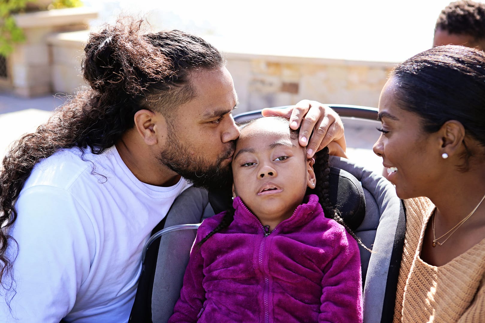 Family with palliative care sign